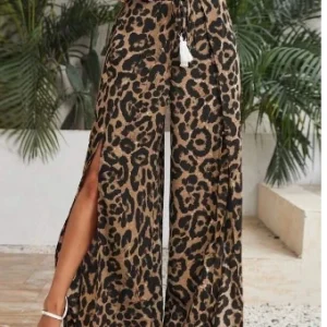 Casual women's long pants daily vacation fashion loose tassel drawstring high waisted leopard print slit loose wide leg pants